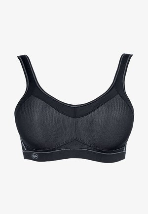 Sort sports-bh med mesh-paneler, brede stropper og en glat stoftekstur. Bemærkelsesværdig sort syning forbedrer designet.