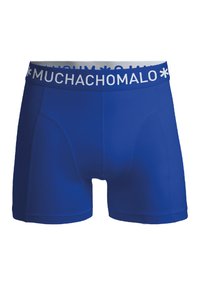 Modri bokserice iz gladkega blaga, z belim elastičnim pasom s brandingom "MUCHACHO". Vključujejo oblikovan sprednji žep.