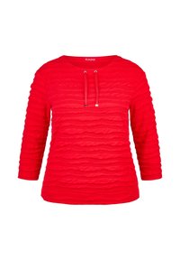 Rotes langärmeliges Oberteil mit einem strukturierten, wellenförmigen Design. Mit einem runden Ausschnitt, verstellbaren Kordeln und dezenten metallischen Akzenten.