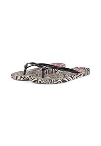 Black flip-flops with a patterned sole featuring zebra stripes in cream and black. Slim, flat rubber straps, with a subtle logo accent.