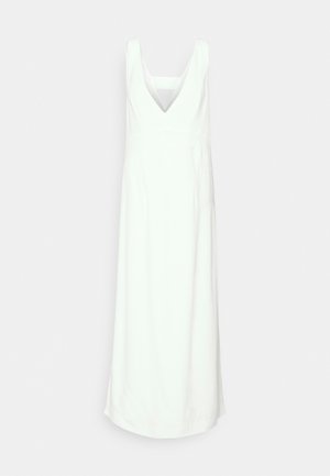 Vestido branco sem mangas com um decote em V profundo, corpete justo e saia reta. Feito de um tecido suave sem padrões ou peças de metal visíveis.