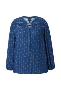 Marineblauwe blouse met lange mouwen, knoopsluiting aan de voorkant en transparante horizontale details over de borst. Versierd met verticale lijnen van kleine hartjes.