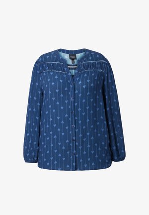 Blusa blu navy con maniche lunghe, chiusura con bottoni frontali e dettagli trasparenti orizzontali sul petto. Decorata con motivi a linee verticali di piccoli cuori.
