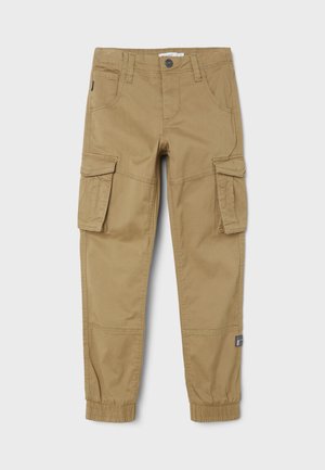Beige cargo hlače iz bombaža, s številnimi žepi, elastičnimi manšetami in šivanimi detajli. Gladka tekstura s klasičnim krojem.