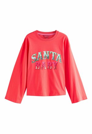 Koralinė ilgoji rankovė marškiniai, pagaminti iš medvilnės. Priekyje turi užrašą "SANTA BABY" daugiak coloriais, raštuotais šriftais. Apvalus kaklas.