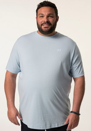 Hellblaues kurzärmliges T-Shirt mit Rundhalsausschnitt, aus weichem Stoff. Verfügt über ein dezentes Logo auf der Brust und einen lockeren Sitz.
