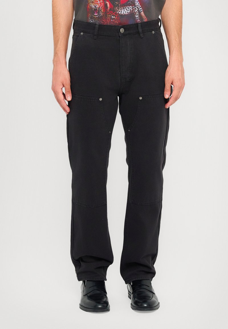 Black cargo pants with a straight fit, featuring side pockets and silver hardware accents. Made of durable fabric with a smooth texture.