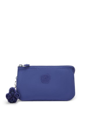 Purple zippered pouch in durable fabric, featuring a round logo and a furry purple charm attached by a silver keyring.