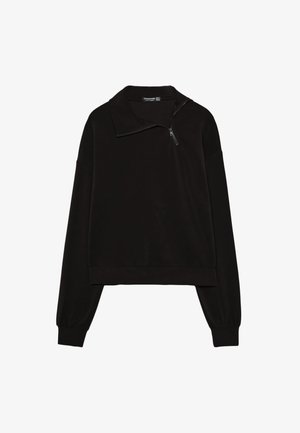 Schwarzer Pullover-Sweatshirt mit hohem Kragen und halbem Reißverschluss, mit langen Ärmeln und lockerem Schnitt. Glatter Stoff mit matter Oberfläche.