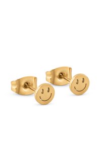 Orecchini a perno color oro con design circolare decorato con un motivo a faccina sorridente in rilievo, finitura opaca e chiusura posteriore sicura.