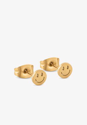 Aranyszínű bedugós fülbevalók, kör alakú kialakítással, dombornyomott mosolygós arcmintával, matt felülettel és biztonságos patentzárral.