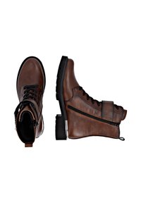Brown leather ankle boots with a black rubber sole, featuring laces and a side zipper, accented by a strap across the upper.