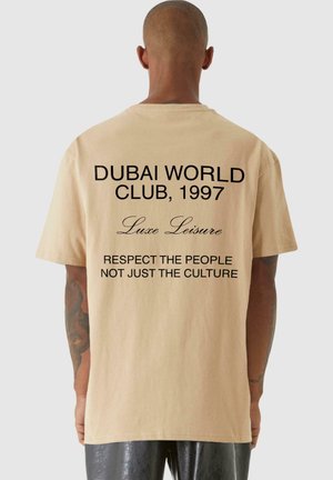 DUBAI WORLD - T-shirts print - unionbeige