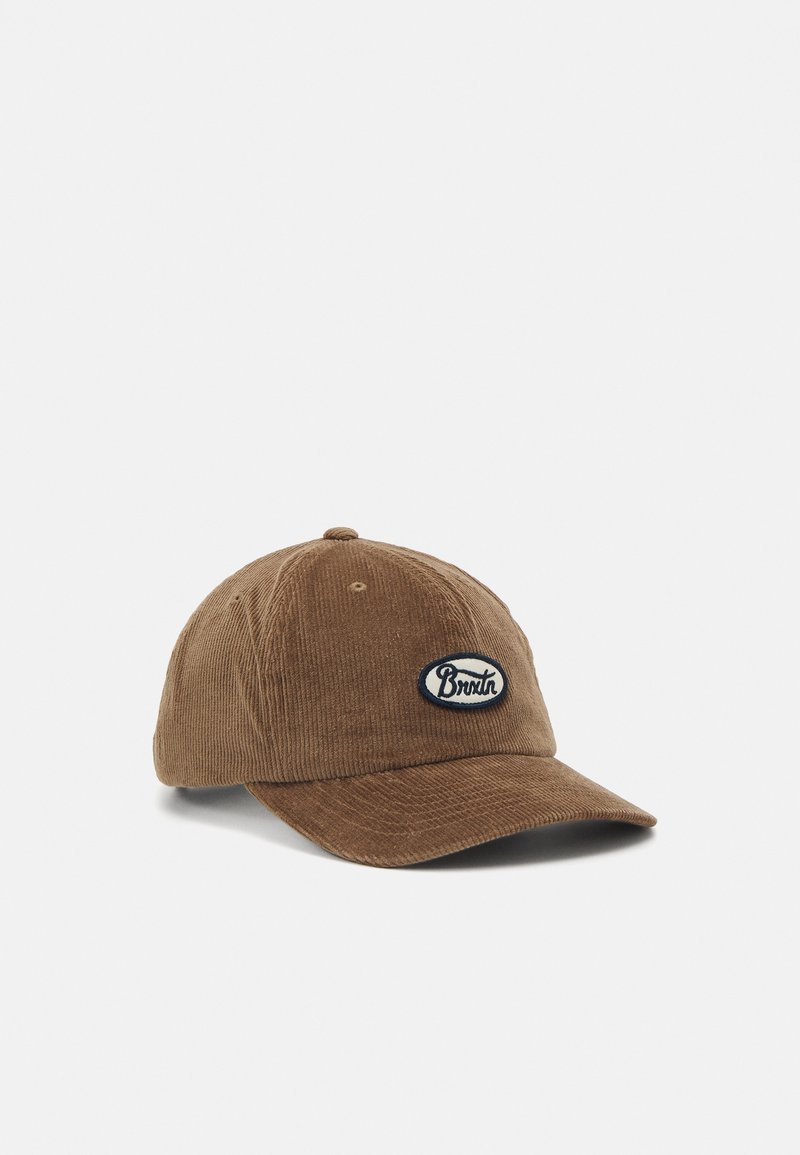 Casquette de baseball en velours côtelé marron avec une visière incurvée et un petit patch logo ovale sur le panneau avant.
