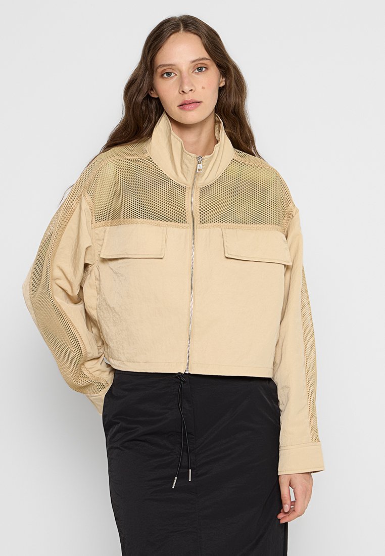 Calvin Klein Jeans Lichte jas zandkleur Calvin Klein Jeans Lichte jas zandkleur