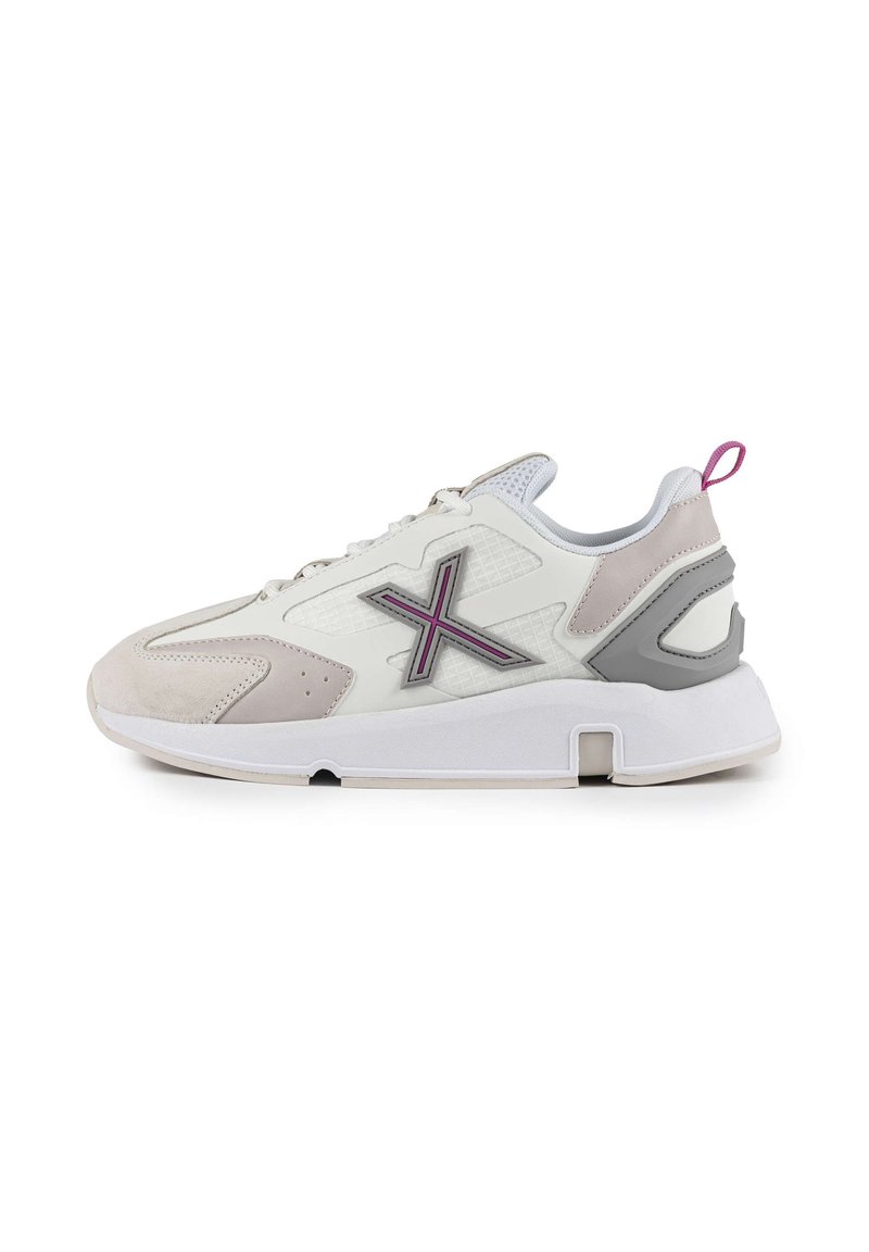 Sneakers with a white mesh and leather upper, gray accents, and pink logo. Features a textured panel and a pull tab at the back.