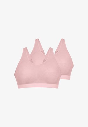 Deux soutiens-gorge sans armatures en dentelle rose clair avec bretelles larges et bandes élastiques sous la poitrine sur fond blanc.