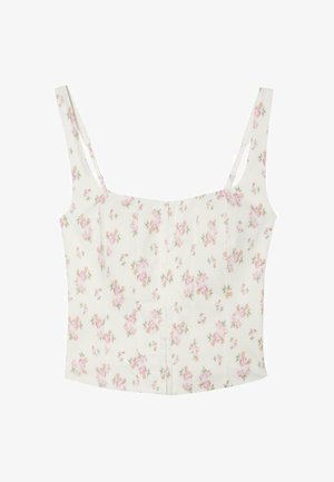 Débardeur court blanc à fines bretelles, avec un motif de petites fleurs roses et orange.