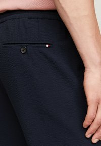 Tommy Hilfiger Träningsbyxor - dark blue