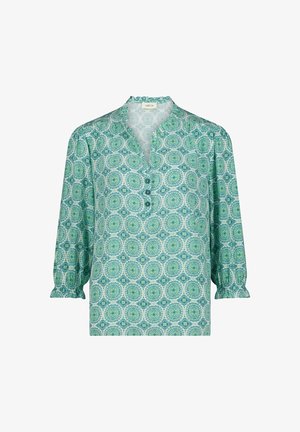 Blouse à manches longues avec motif floral circulaire vert et bleu, poignets à volants, col en V avec trois boutons et détail col.