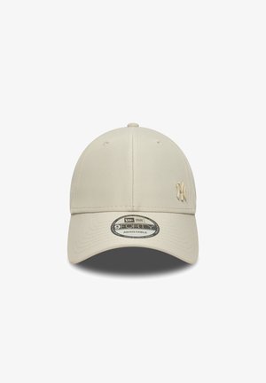 Beige baseball cap made of soft fabric, featuring a curved visor, adjustable strap, and a raised logo on the front. 9FORTY style label attached.