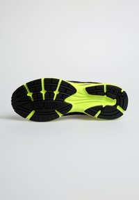 Black athletic shoe sole with a contrasting bright yellow midsole. Features textured rubber tread and the "CAMP DAVID" logo embossed.