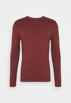 Langärmliger Pullover aus ribbeligem Strickstoff in Dunkelrot. Verfügt über einen runden Ausschnitt und eine enganliegende Silhouette, ohne zusätzliche Verzierungen.