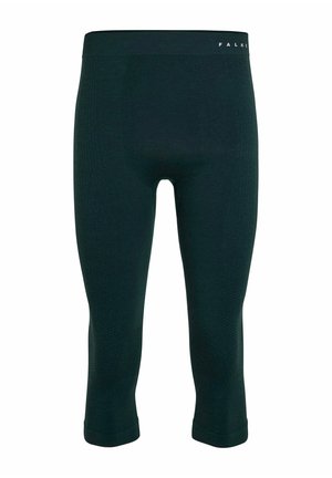 Donkergroene capri legging van gestructureerde stof, met een nauwsluitend ontwerp en een elastische tailleband met de merknaam "FALKE" erop gedrukt.