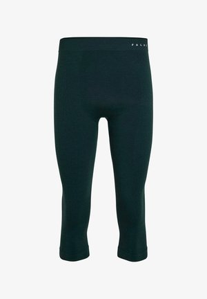 Donkergroene capri legging van gestructureerde stof, met een nauwsluitend ontwerp en een elastische tailleband met de merknaam "FALKE" erop gedrukt.