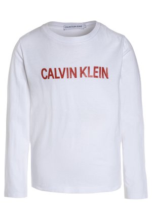 Valkoinen pitkähihainen paita, jossa punainen "CALVIN KLEIN" -logo rinnassa. Valmistettu pehmeästä puuvillasta, pyöreä pääntie ja normaali istuvuus.