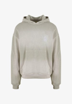 Light gray oversized hoodie with a front pocket and ribbed cuffs, featuring a subtle logo detail on the chest. Soft fabric texture.