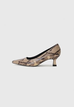 Pointed-toe pump in faux snake print, featuring beige and brown tones, a black interior, and a low, curved heel. Textured surface detail.