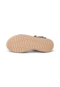 Ruskea kumipohja, jossa on raekuvio. Sisältää beige-välyksen, jossa on kohokuvioitu brändilogo ja mustat hihnat tukevan istuvuuden varmistamiseksi.