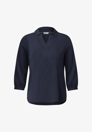 Granatowa bluzka z długim rękawem, w dekoltem w serek i teksturowanej tkaninie. Posiada podwijane mankiety i lekko zaokrąglony dół.