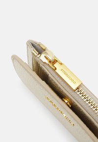 Coccinelle Wallet - pale gold