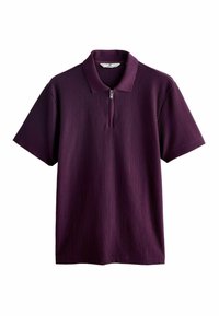 Polo à manches courtes en violet foncé, avec un design texturé en côtes et un col zippé. Tissu doux, coupe décontractée.
