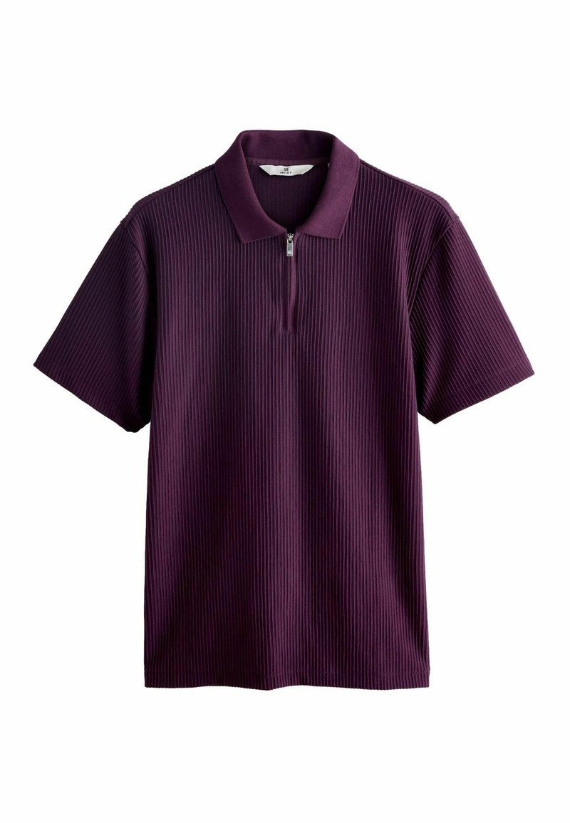 Polo à manches courtes en violet foncé, avec un design texturé en côtes et un col zippé. Tissu doux, coupe décontractée.