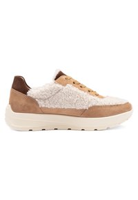 Low-top sneaker with beige suede, white shearling panels, tan laces, and thick off-white rubber sole, viewed from the outer side.
