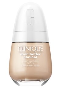Clinique Even Better Clinical Serum Foundation, durchsichtige braune Flüssigkeit in einem runden Glasbehälter mit weißem Deckel und prägnantem Logo. SPF 20.