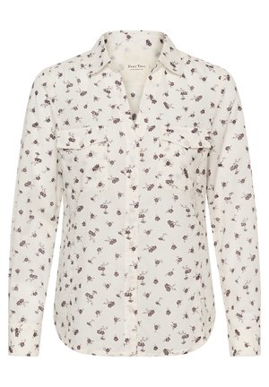 Krekls ar garām piedurknēm krēmkrāsas audumā ar ziedu rakstu violetā un tumšsarkanā krāsā, divām priekšējām kabatām un apkakles izgriezumu.