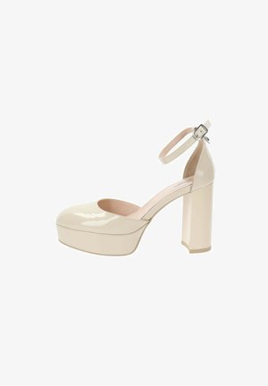 Scarpe con plateau in pelle verniciata beige, con punta tonda, cinturino alla caviglia e tacco spesso, caratterizzate da una consistenza liscia e lucida.