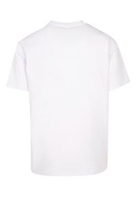 Hvid bomulds t-shirt, korte ærmer, rund hals, ensfarvet design, glat tekstur, ingen synlige mønstre eller udsmykninger på bagsiden.