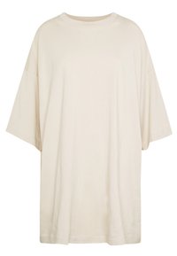 Oversized beige T-shirt van zachte katoen, met een ronde halslijn en korte mouwen, met een relaxed fit en minimale naden.