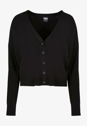 Schwarze, kürzere Strickjacke mit tiefem V-Ausschnitt, langen Ärmeln und sechs vorderen Knöpfen. Weicher Stoff mit glatter Textur und minimaler Detailierung.