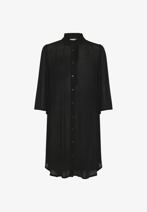 Fekete gombos ing, átlátszó anyagból, fodros gallérral és háromnegyedes ujjakkal. Egyenes szabású és finom tekstúrájú.