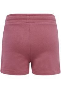 Shorts i ett mjukt rosa tyg med en slät textur. Har en elastisk midja och rena sömmar längs fållen.