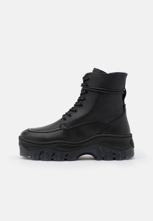 JAXSTAR - Lace-up ankle boots - black