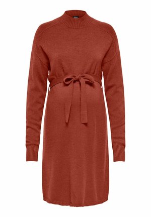 Robe de maternité tricotée couleur rouille, manches longues, col rond et taille cintrée par un lien. Poignets côtelés et ourlet légèrement évasé.