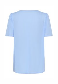 Haut bleu clair à manches courtes avec une coupe décontractée, doté d'un col rond et d'un tissu doux et texturé. Design minimaliste sans ornements.