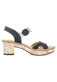 Sandale noire et orange avec une large sangle et un accent circulaire. Talon en liège texturé avec un motif géométrique. Fermeture Velcro.